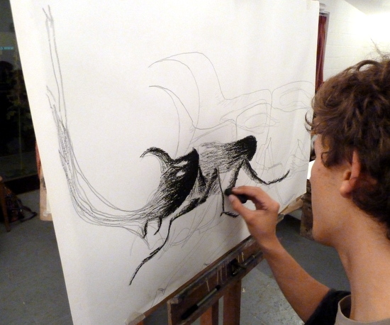 Drawing insects big: Adam drawing a Rhinoserous Beetle on loan from Cambridge University Museum Of Zoology