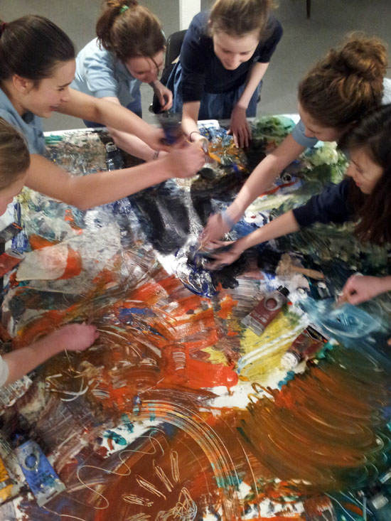 Group Painting Activity Teenagers Battle it Out with Acrylic Paint