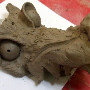 Demon dog head made in clay by student of
