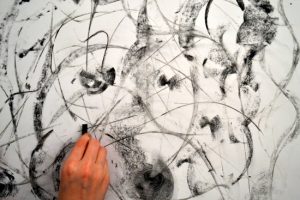 Teenagers Explore Expressive Drawing with Charcoal and Soft Pastels