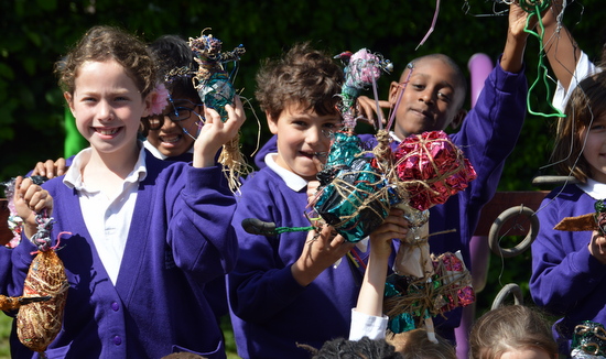 Pupils at Ridgefield Primary School with their finished sculptural birds