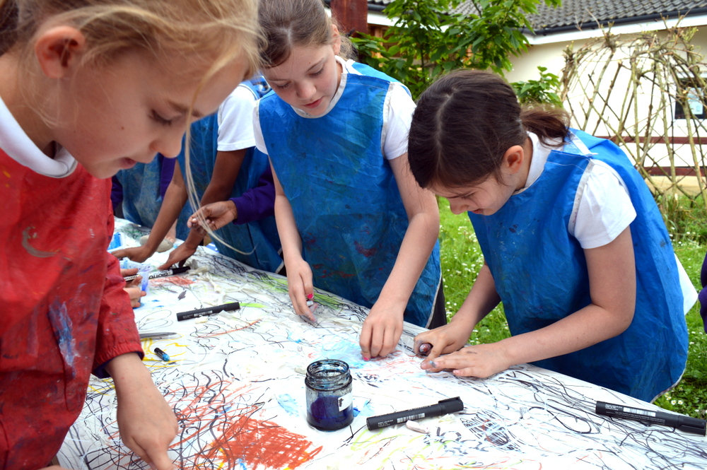 Pupils are then given a selection of oil pastels and encouraged to work energetically with mark making inspired by the water