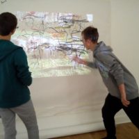 Large scale collaborative drawing activity embeds arm movments in preparation for recreating marks in the dark Sara Dudman