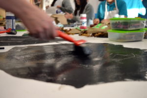 Students enjoyed monoprinting on a large scale by rolling printing ink and acrylic paint directly onto the table and experimenting with ways to take prints.