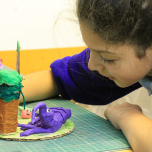 Student with her ant eater sculpture inspired by the Roald Dahl poem The Ant Eater