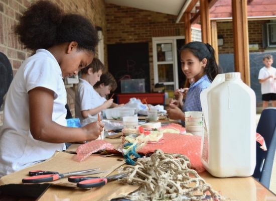 Children start work building reliefs inspired by the 'under the ocean' theme, with a variety of waste materials - SC Ridgefield