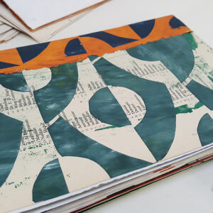 Paula Briggs shares how to make a sketchbook from recycled papers