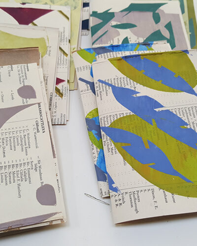 Selection of over printed screenprints, folded in half