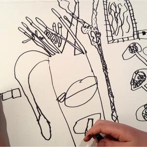 Children experience working together to create a shared drawing, working with pens, ink and quills.