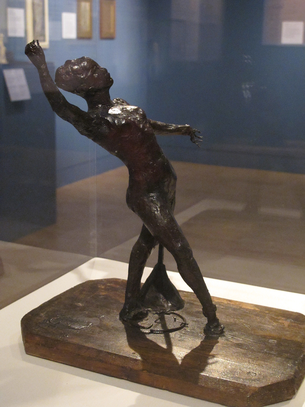Dancer with a Tambourine, 1880s, Coloured wax over a commercially prefabricated metal wire armature, attached the a wooden base