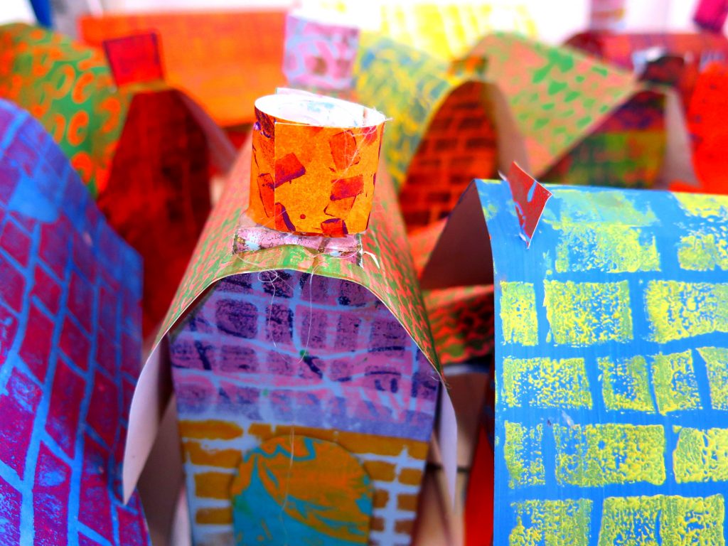 Paper houses made from printed papers