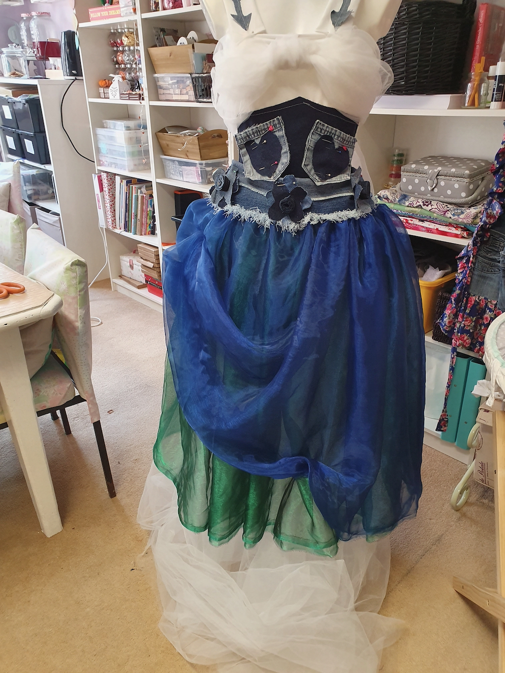 Psyche's dress in mid-construction with blue organza skirt and denim pockets sewn onto the bodice by Fitzy Peters with Natalie Bailey - Inspire