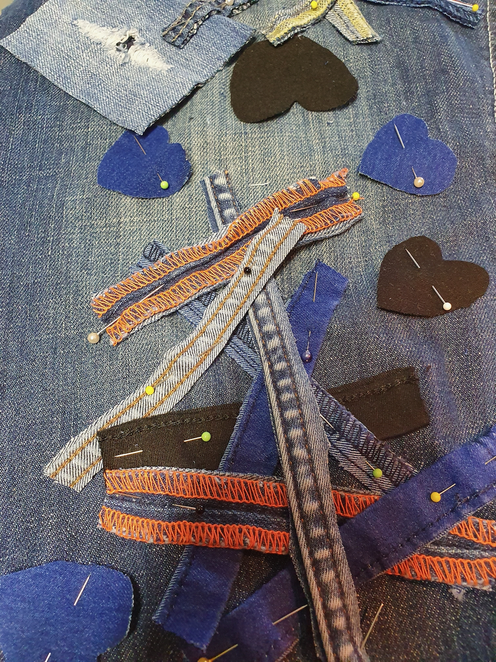Skirt panels pinned into place (hearts made of denim pinned onto a denim panel by the Fitzy Peters with Natalie Bailey- Psyche's Resilience - 
