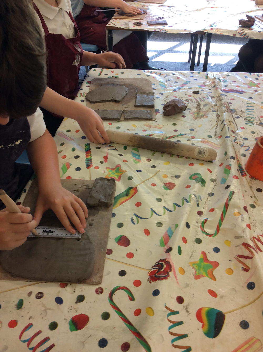 Year six pupils make memory boxes out of clay