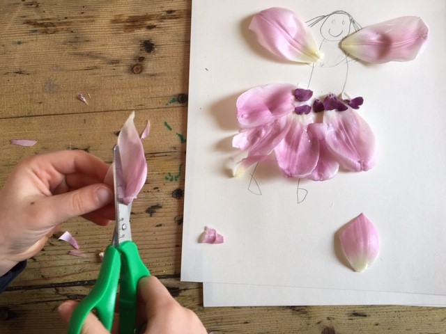 trimming petals with scissors