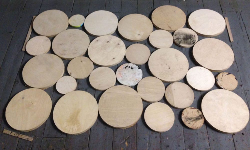 wooden circles ready for sanding and varnishing