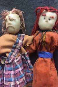 Two puppets showing variation achieved through different costume designs