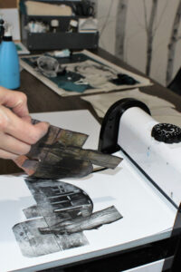 Using a printing press by Karen Wicks