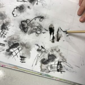 Pupils use inventive and exploratory ways of making marks using a range of drawing tools and ink.