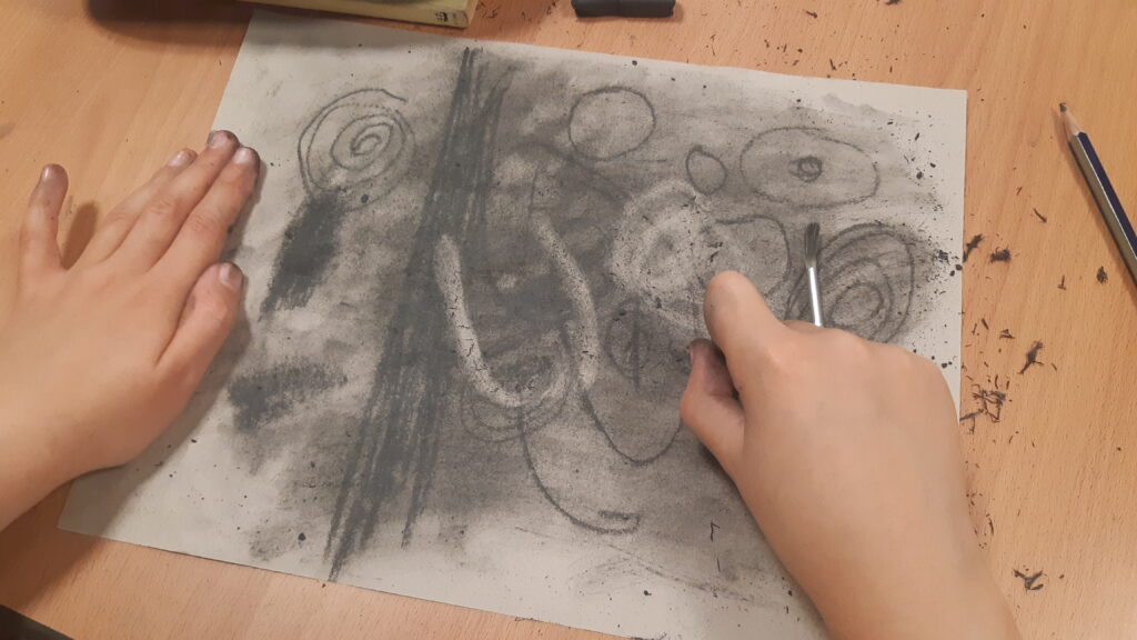 Using an eraser in charcoal