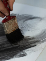 Brushing water Onto Charcoal by Laura McKendry