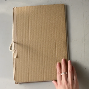 In this resource, you’ll be shown two simple ways of making a sketchbook from cardboard